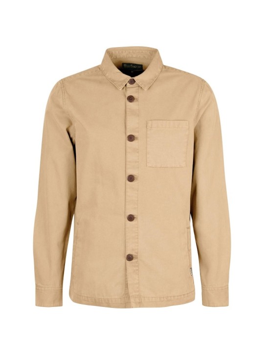 Cette surchemise beige de la marque Barbour est en coton doux. Cette surchemise beige de la marque Barbour est en coton doux.
